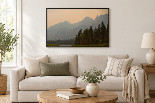 Glacier National Park Wildfire Smoke on the Mountains photograph framed above a neutral living room sofa
