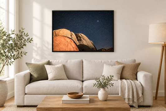 Desert Nights in Joshua Tree photograph framed above a neutral living room sofa